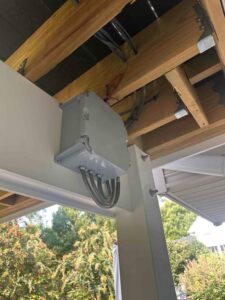 We enhanced a screened porch in Crofton, MD by installing LED tape lighting, rearranging switches for optimal control, and upgrading the breaker to ensure reliable power for all outlets.