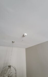 Deshaies Electrical Services replacing a hardwired interconnected smoke detector for enhanced fire safety