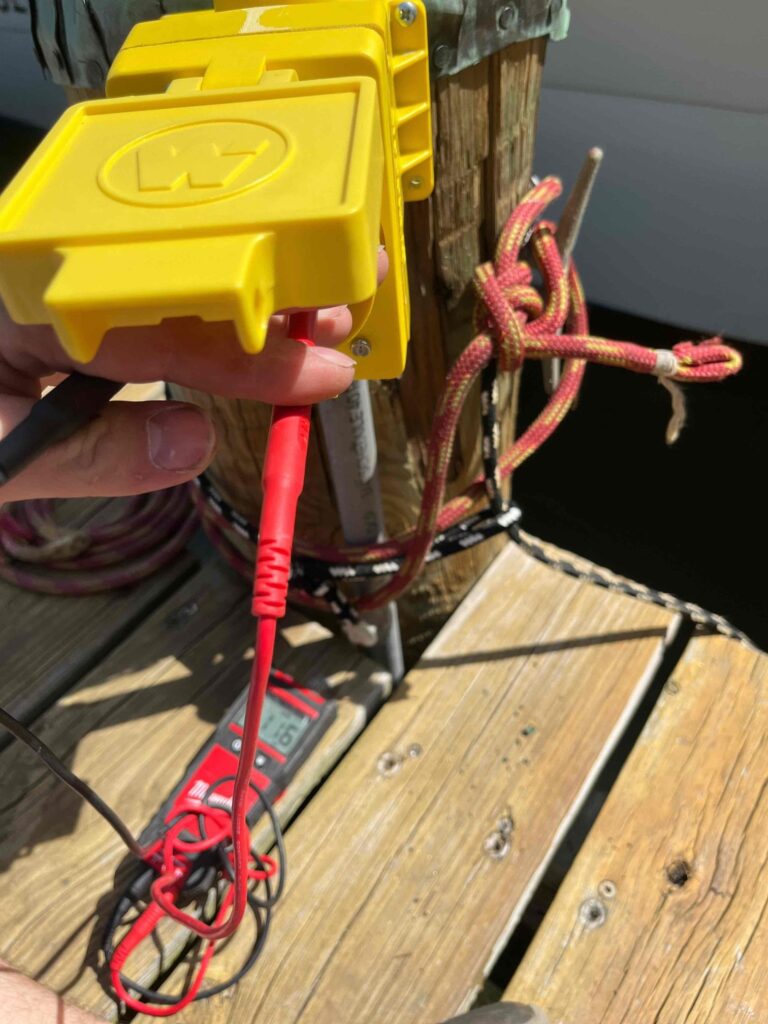 Deshaies Electrical Services testing electrical connections for pier wiring installation