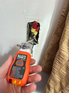 Deshaies Electrical Services testing wiring connections for home outlet upgrades